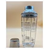 New glass cocktail shaker with recipes on outside