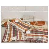 Lot of 8 printed rugs and one home decor item