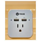 Outlet extender with phone holder