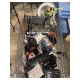 Large cart of various electronics