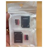 Two 128GB memory cards with adapters
