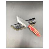 Damascus knife features a distinctive, water-like