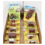 (11) pieces; Hesston Farm Toys 1/64 scale by