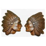 Pair of Paul A. Taran carved Indian Head wall