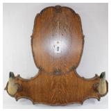 Ornate oak mounting plaque w/hoof hooks