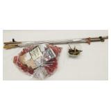 assorted lot of gun cleaning rods and brushes