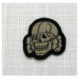 SS Totenkopf green backing for hat insignia