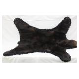 Black Bear skin rug, 62" long x 60" wide