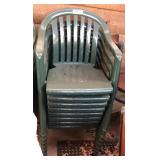 stack of 8 Grosfillex resin outdoor arm chairs