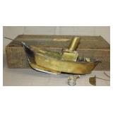 brass hot air powered boat in wood box with