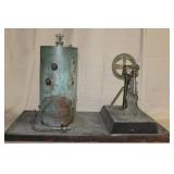 brass scale model steam engine, door is