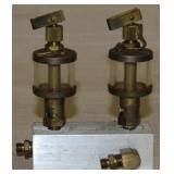 2 oilers, 1.25" dia. mounted on aluminum