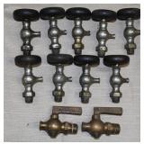 9 nickeled drain valves w/wooden knobs, 2 brass