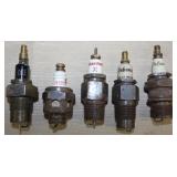 (5) spark plugs, (2) "Defiance", (1) "CHAMPION X",