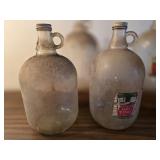 (4) One Gallon Jugs and (1) Gallon Jar