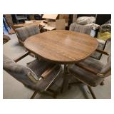 Dining Room Table with 4 rolling chairs & leaf