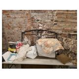 Full size metal headboard, various linens