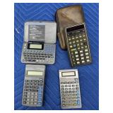 (4) Vintage Calculators - TI, Radio Shack,