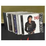 (9) Michael Jackson CDs