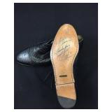 Autographed shoes worn by Troy Aikman