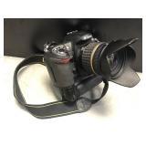 Nikon Digital Camera with Tamron Lens.