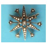 14-KARAT GOLD STARBURST BROOCH