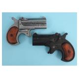TWO REPLICA DERINGER POCKET PISTOLS