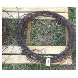 24" Roll of Barbed Wire.