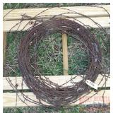 24" Roll of Barbed Wire.