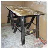 2 Metal Saw Horses & Plywood.