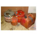 4 Assorted Gas Cans.