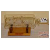 Blown Glass Ship in Bottle W/ Stand. Blown Glass Ship in Bottle W/ Stand.
