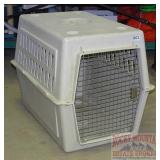 Plastic Animal Kennel.  27X24X35.