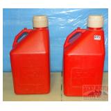 2 RCI Red Gas Cans. 2 RCI Red Gas Cans.