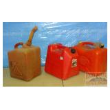 3-5 Gallon Gas Cans, 1 has some gas. 3-5 Gallon Gas Cans, 1 has some gas.