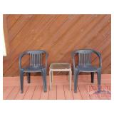 2 Black Plastic Chairs & Side Table. 2 Black Plastic Chairs & Side Table.
