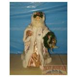 25" Santa W/ Wreath Figurine.