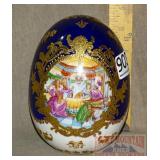 Large Porcelain Egg W/ Gold Overlay.