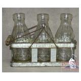 3 Glass Milk Bottles in Galvanized Carrier.