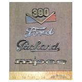 4 Assorted Vintage Automobile Emblems.