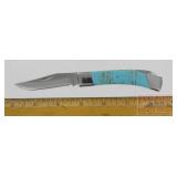 Lock Back folding Knife W/ turquoise Handles.