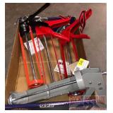 4 caulking guns, (3 skeleton style)