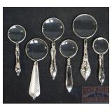 Neat 6 Piece Silver Tone Magnifier Set.