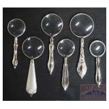 Neat 6 Piece Silver Tone Magnifier Set.