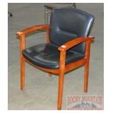 Cherry Finish Arm Chair W/ Black Upholstery.