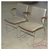 2 Modern Style Stacking Chairs.