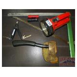 Multi-Tool, Camp Saw, Hatchet & Flashlights.