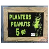 Planter's Framed Glass Advertisement.