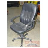 Nice Roll Around Adjustable Black Office Chair.