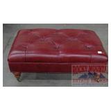 Leather Upholstered Ottoman.